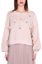 Dixie felpa oversize con strass e piume rosa