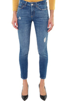 Blu Denim jeans vita alta con rotture e bottone gioiello blu