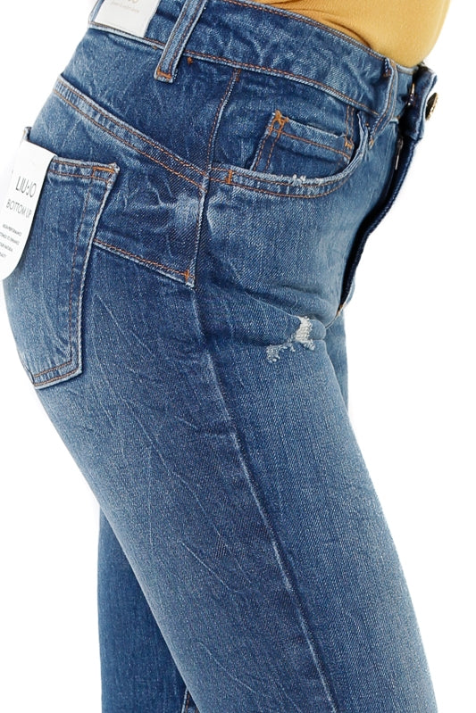 Blu Denim jeans vita alta con rotture e bottone gioiello blu