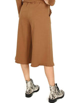 Le Streghe pantalone in felpa cropped orlo unfinished coccio