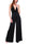 ELEGANTER ÄRMELLOSER JUMPSUIT MIT SCHWARZEM JUWELEN-ACCESSOIRE